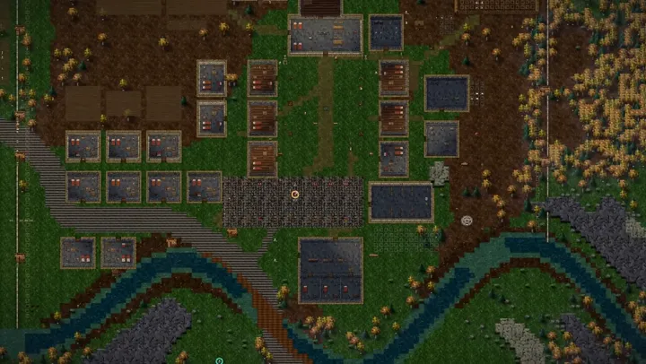 The camera pulling back from the settlement to show the walled town and surrounding ground